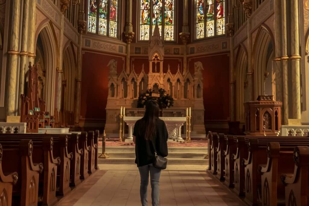 woman-standing-in-church